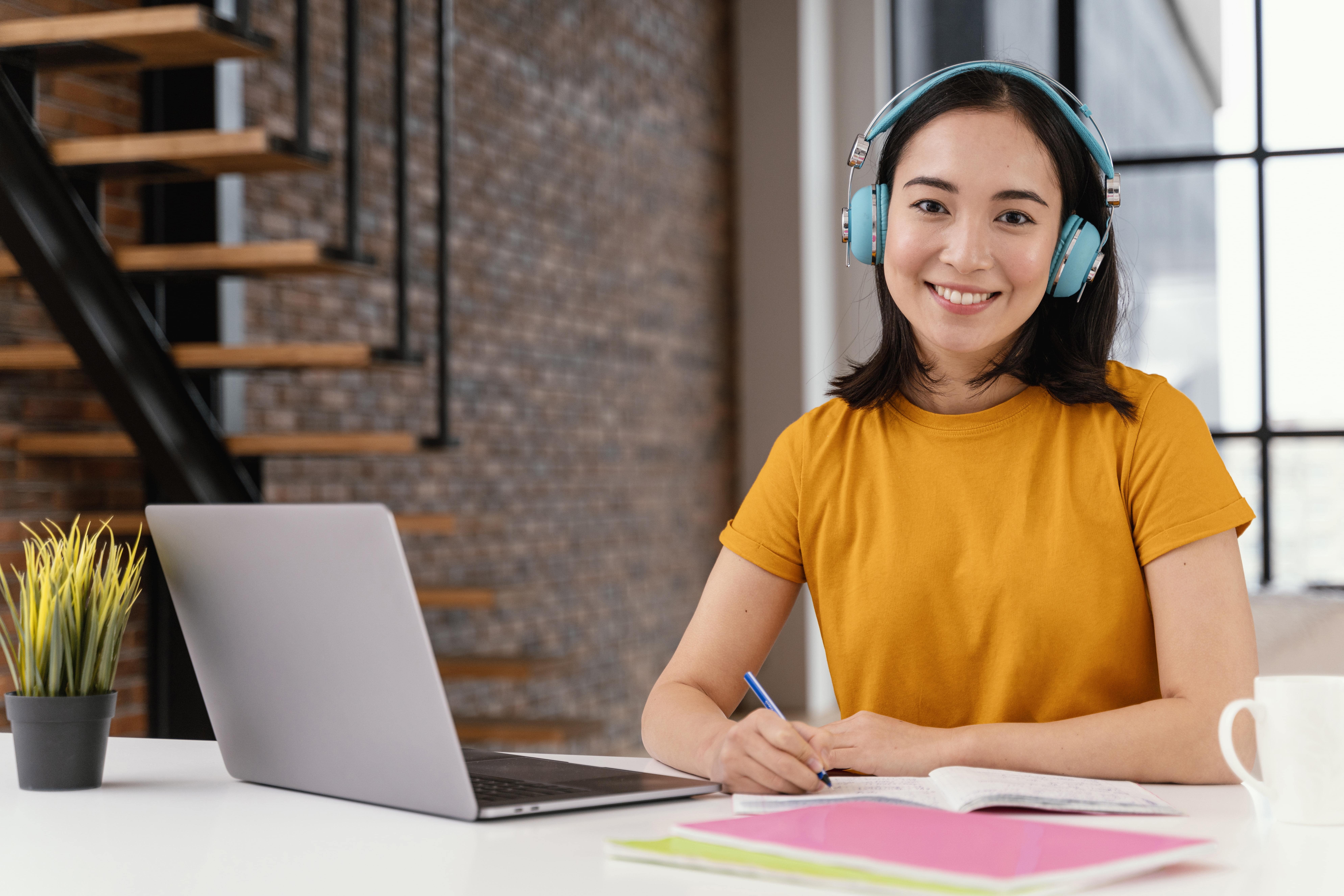 young-woman-attending-online-class-min.jpg