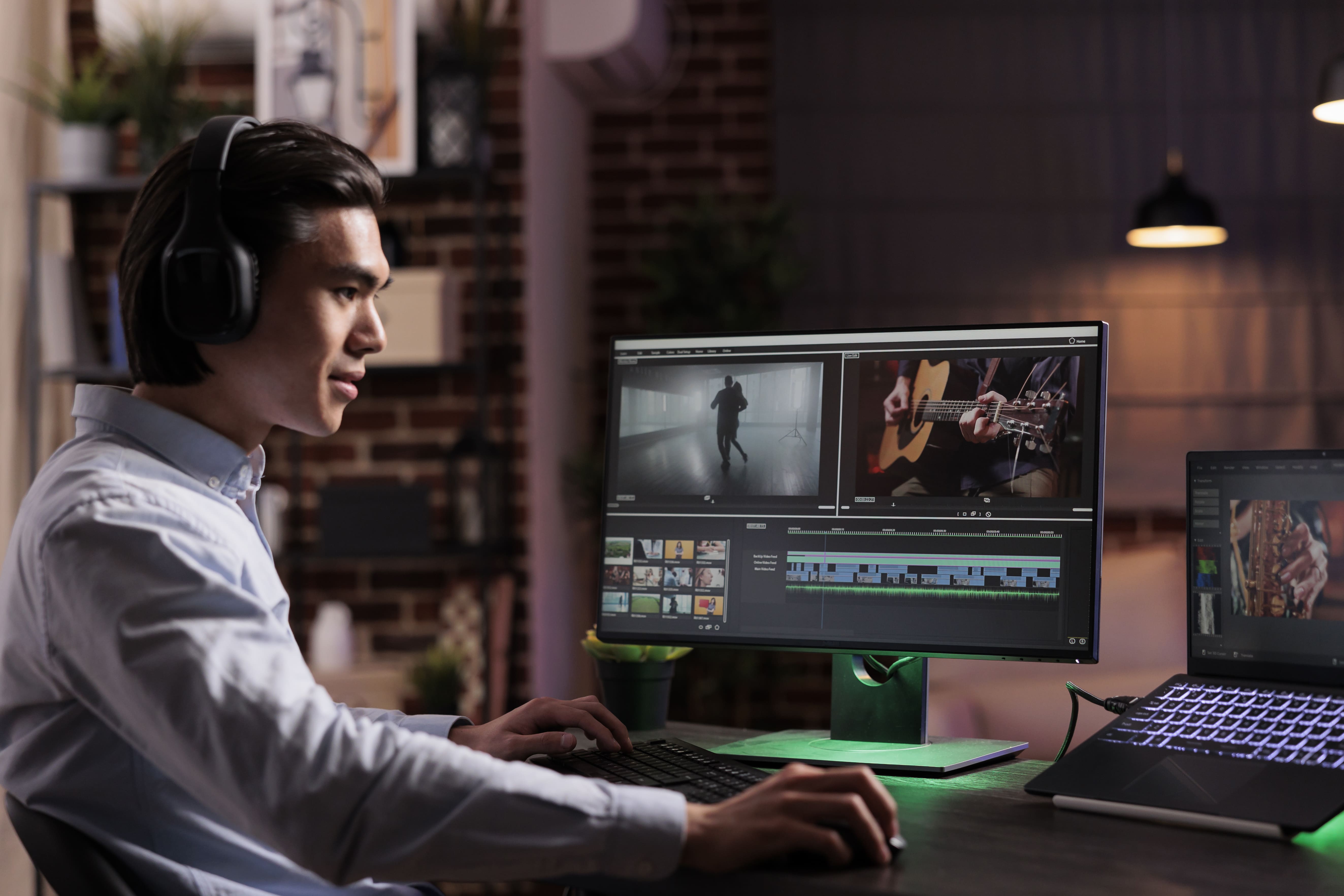 male-freelancer-working-movie-production-with-computer-software-editing-film-montage-with-audio-visual-effects-creating-multimedia-content-with-footage-color-grading-creative-app-min.jpg